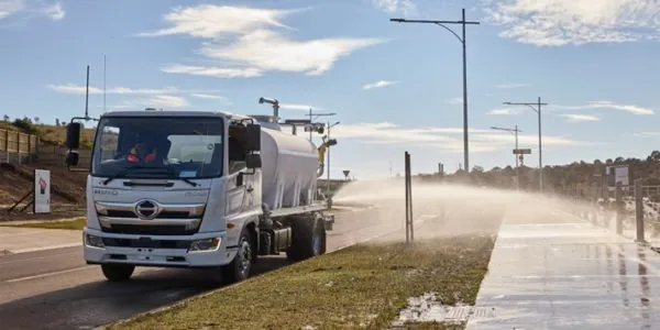 Water truck being used for dust control measures
